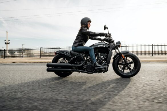 Lone female rider on an Indian Motorcycle Scout Bobber Sixty