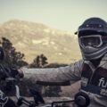 Rider wearing white Fuel Rally Raid Motorcycle Jacket