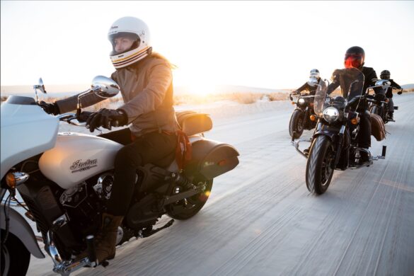 Motorcyclists riding on Indian bikes on a desert road