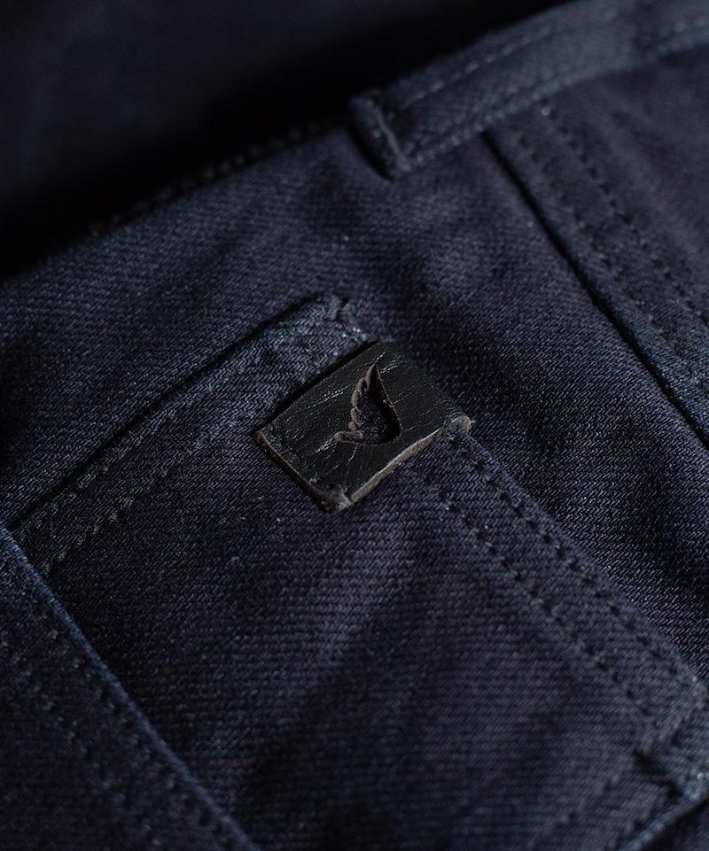 Leather tab Saint Jeans - close-up