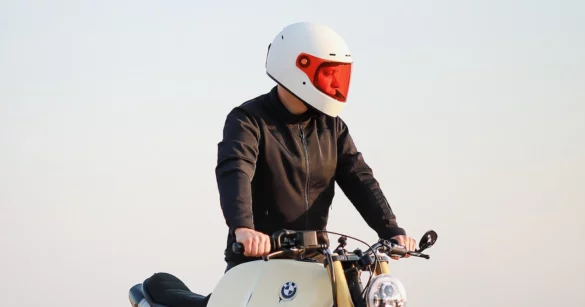 Rider Pushing BMW Airhead wearing JD One Off White with Set RACE ONLY Visor Orange landscape