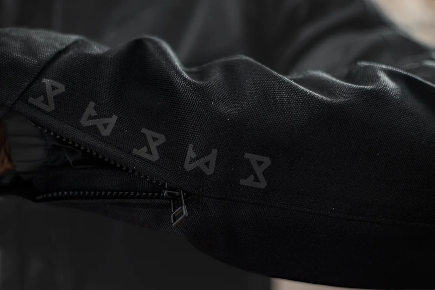 Reflective Rune graphics on the sleeves