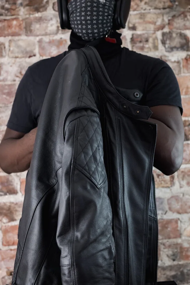 Pando Moto Twin Leather Jacket Review - Road Tested over 620 miles: Looks and Excellent Performance 9 Rider holding Pando Moto Jacket wearing Hedon Heroine